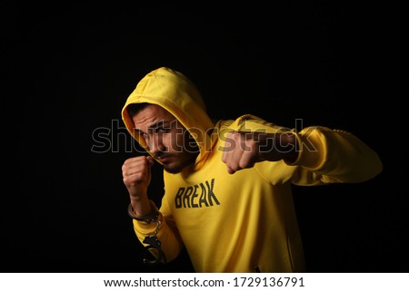 Model with portrait and boxing movements in the studio