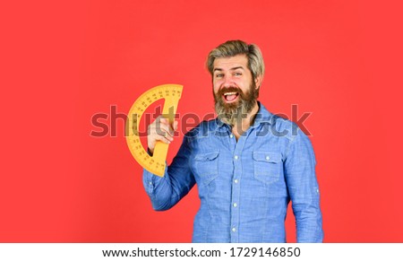 school teacher use protractor. math and geometry subject. back to school. ready for engineering. tool for graphics. mature bearded man hold protractor ruler. study at home. education.