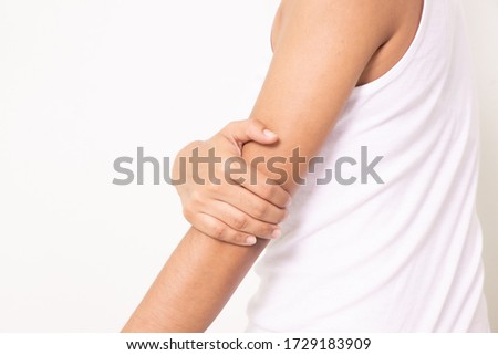 woman suffering from arm pain, painful in arm muscles.arm muscles isolated on white background.