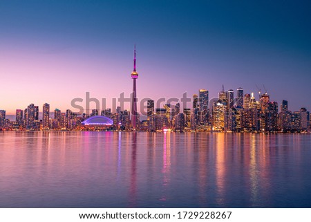 Toronto city view at night after the sunset. The view from Center Island in Lake Ontarion