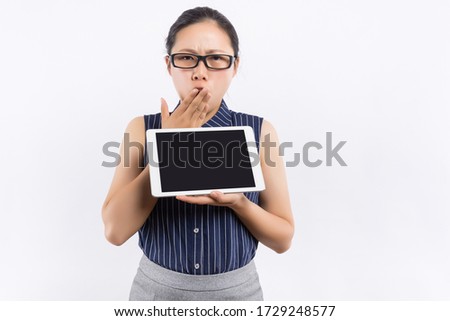 Businesswoman holding tablet in hands isolated