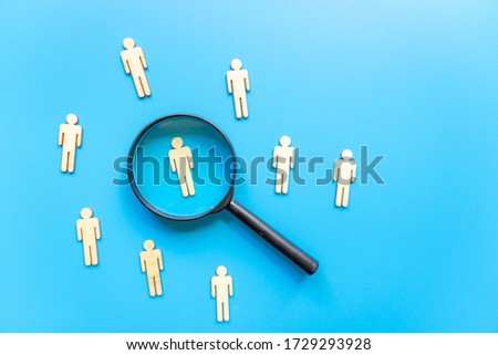 The crowd of wooden figures of people. Concept of business team. Labor collective. Teamwork. Employees. Human Resource Management. Labor market. Demographic situation. Population Royalty-Free Stock Photo #1729293928