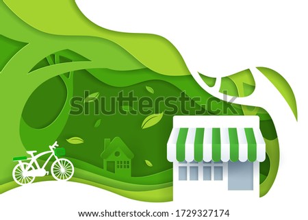Paper art and digital craft style of nature landscape with bicycle, convenience stores and green eco forest, Green eco friendly city concept. eps 10 vector.