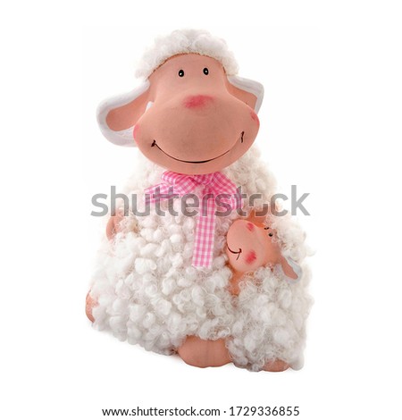 Isolated close up view of figurine of an happy Easter sheep on white background.