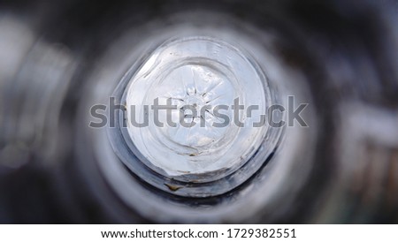 The inside of the bottom of the water bottle .