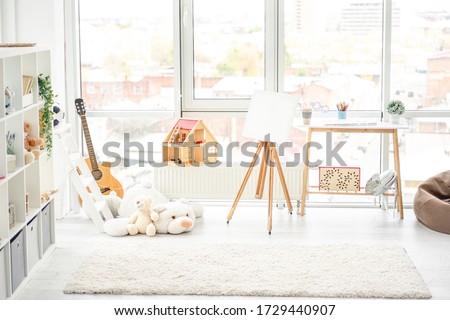 Beautiful, cozy and light children room Royalty-Free Stock Photo #1729440907