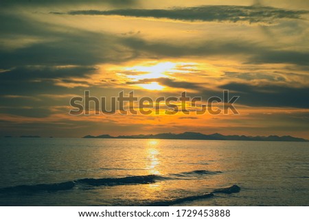 Sunset over the sea with beautiful blazing landscape.