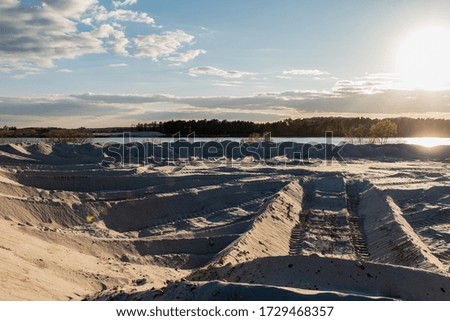 spring sunset on a sand quarry