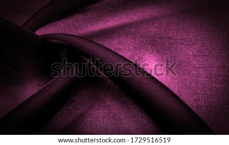 Background texture Dark red chiffon silk is a soft transparent fabric with a slight roughness (matte, creped) due to the use of twisted yarn.