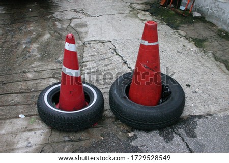 Two rubber cones and tires