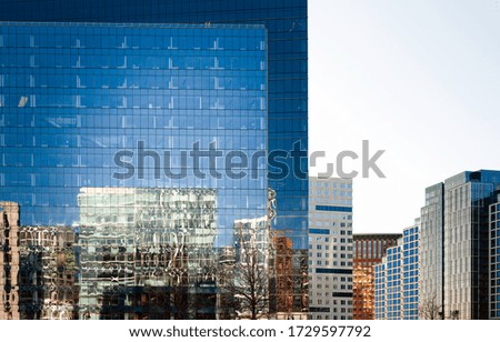 Reflections on the Glassy Buildings in the City