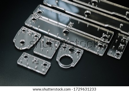 Plexiglass parts for cnc machine. Acrylic form machine parts, laser cutting and engraving
 Royalty-Free Stock Photo #1729631233