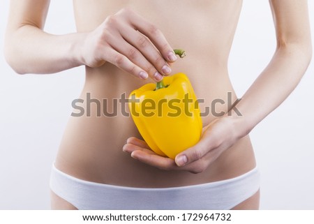 Female body and pepper