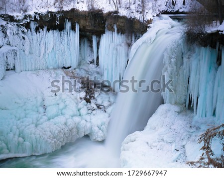 A picture of the greatest waterfall of Minnehaha Falls in Minneapolis, Minnesota. Taken in the middle of a freezing Minnesota winter.
