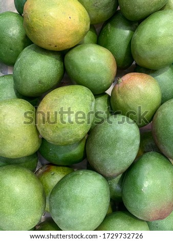 ripe mango fruit for eating as a background