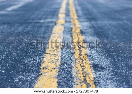 Dividing Lines of a Road at Sunset