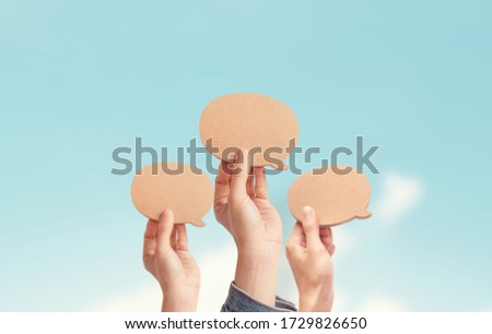 Many people showing a Blank Speech Bubble, process of discussion and commenting, Best thought, good idea, positive feedback. Opinion of the public and surrounding people Royalty-Free Stock Photo #1729826650
