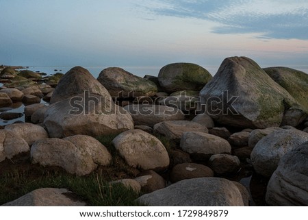 City Tuja, Latvia. Baltic sea with rocks and sunshine. Travel photo.10.05.2020