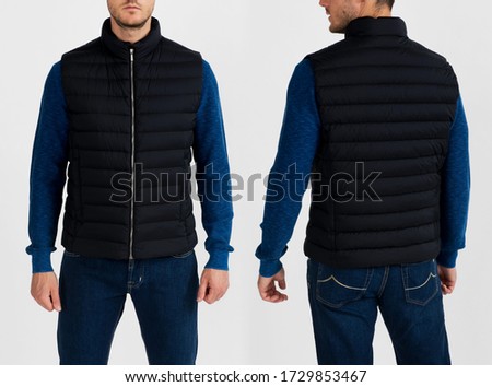 A man in a black warm vest. Black male vest template, front view, rear view Royalty-Free Stock Photo #1729853467