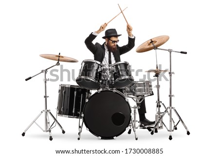 Drummer starting to play drums and holding drumsticks in the air isolated on white background Royalty-Free Stock Photo #1730008885