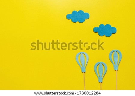 flatout Birthday party card on a blue background with copy space for text