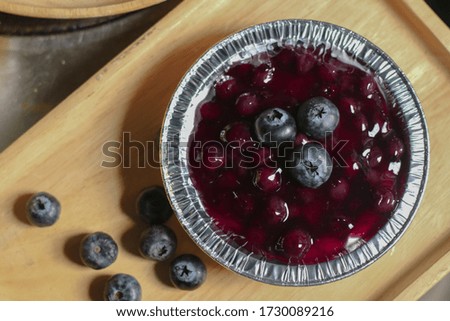Blueberry Cheese Pie, cheese cake on wooden table.