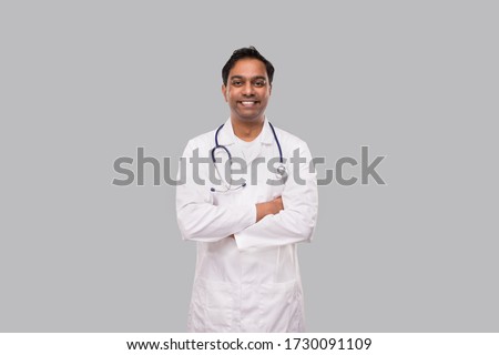 Indian Man Doctor Smiling Hands Crossed Isolated. Healthy life, Medicine Concept. Royalty-Free Stock Photo #1730091109