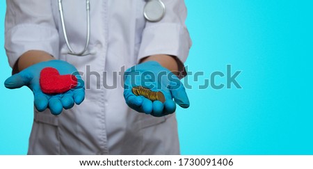 a doctor holding a heart in one hand and money in the other, a banner on a blue background, the concept of corruption in medicine.