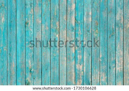 Wall of wooden planks of blue color with cracks. Background for design. Royalty-Free Stock Photo #1730106628