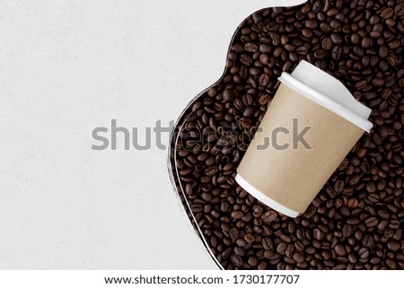 cup of coffee on old paper background. space for text