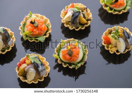 cream tartlets, 
fruit tartlets, tartlets with strawberries, tartlets with salad, 
 with prosciutto.