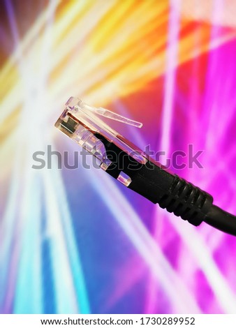 High-speed fiber optic Internet cable amid lights in an entertainment club.