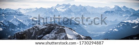 panoramic view from mount pilatus on sunny winter day in lucerne Royalty-Free Stock Photo #1730294887