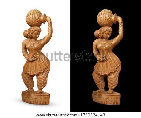 A Small Size Wooden Statue of lady Holding Water Pot on Her Head - Showpiece - Isolated Royalty-Free Stock Photo #1730324143