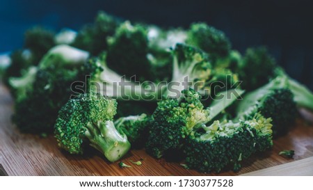sliced broccoli set on the table