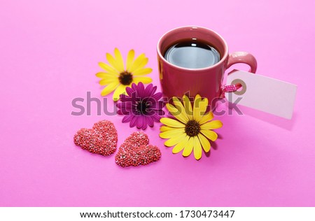 Cup of coffee and chocolate hearts. Love or mother's day concept.