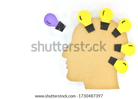 Unique business idea, new innovation and trend setter concept. Human male head profile silhouette with light bulb. 