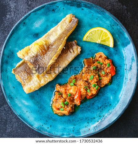 Fried fish fillet hake, seafood main course pescatarian Menu concept. food background. top view copy space for text keto or paleo diet