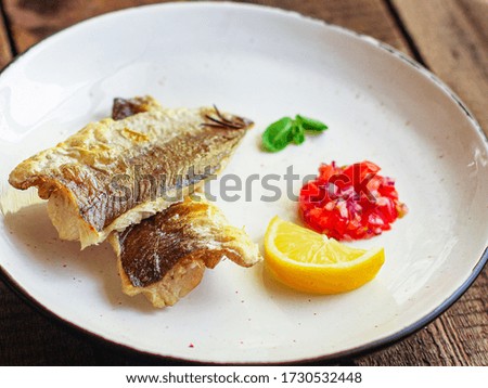 Fried fish fillet hake, seafood main course pescatarian Menu concept. food background. top view copy space for text keto or paleo diet
