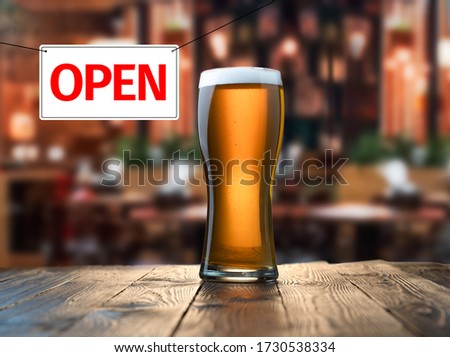 It is open again. Out of isolation due to pandemic. Premises of pub are open. Concept of opening public places.