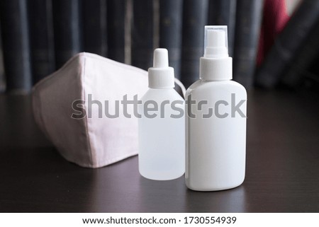 Face Mask and Sanitizers on a table