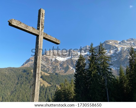 Christian crucifix on the hills and lookouts over the Eigental alpine valley, Eigenthal - Canton of Lucerne, Switzerland (Kanton Luzern, Schweiz)