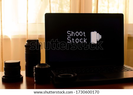 text on laptop screen Shoot Stock and photo lenses