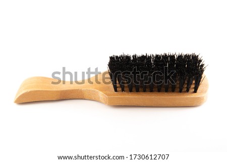 A Small Bristled Hair Brush Royalty-Free Stock Photo #1730612707