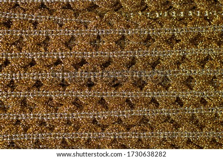 yellow fabric texture of golden cloth with a pattern