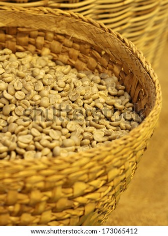 coffee bean in basket, Thailand ,fresh white coffee bean before roast agriculture harvest from garden , food ingredients