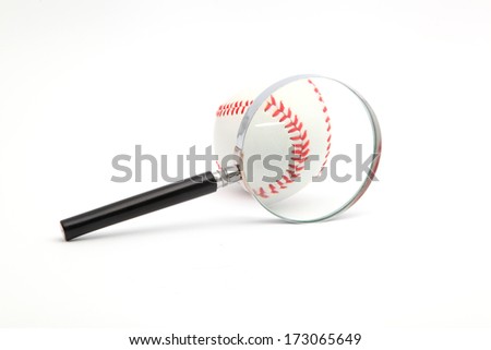 lens and a baseball on a white background
