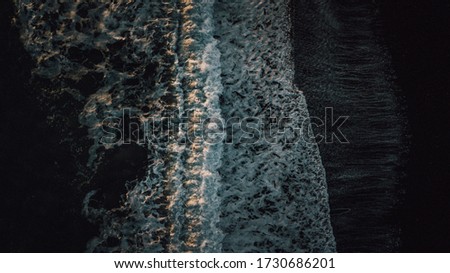 Amazing aerial shot of the black sandy beaches in Iceland. The very unusual sight of spectacular black sand. Picture taken in scenic Iceland.