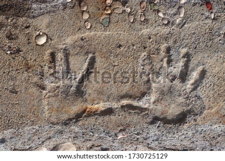 Handprint on an old concrete Royalty-Free Stock Photo #1730725129