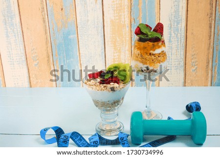 Breakfast with yogurt, muesli and Healthy Diet concept with Delicious fruit, greek yogurt and granola parfaits as weight lose image.